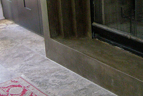 Concrete floor and fireplace